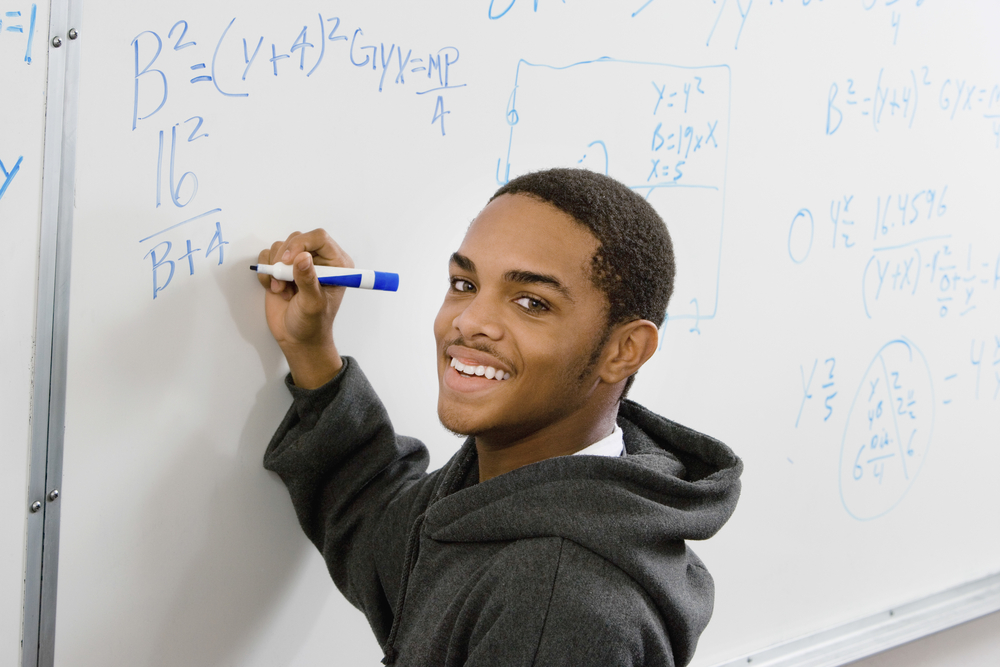 A happy student doing math